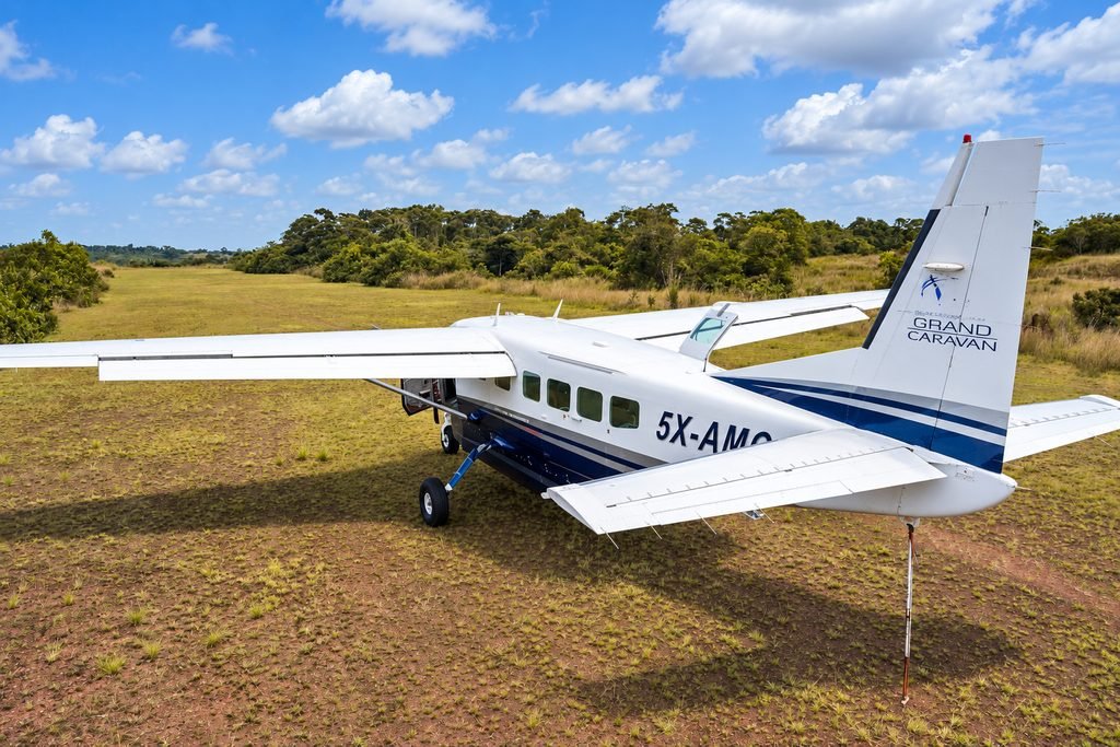 Grand Caravan with Asante titles on the tail